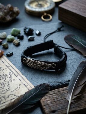 Hand Crafted Black Bracelet with Silver Feather Accent